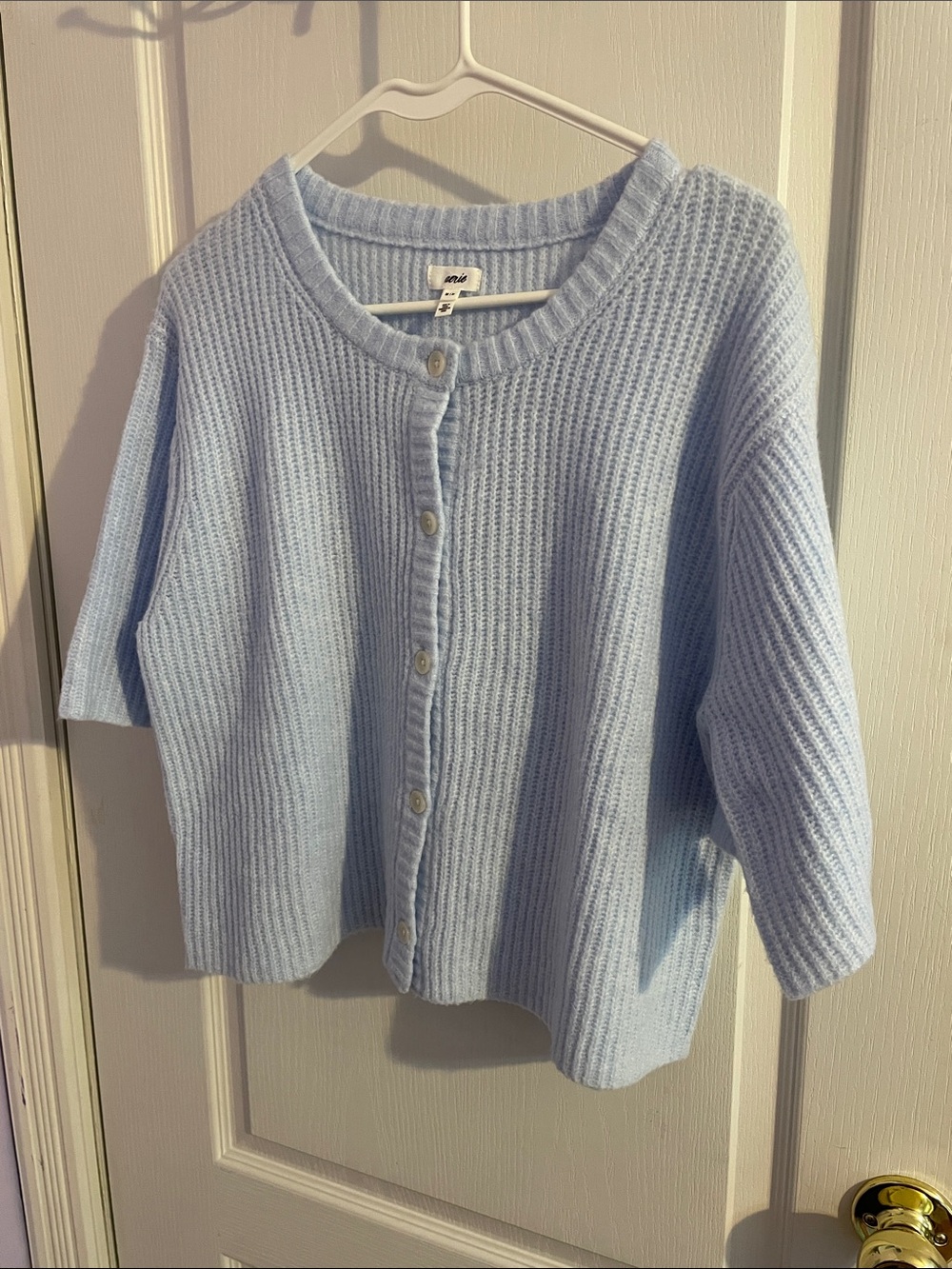 aerie Unreal Ribbed Short-Sleeve Button Front Cardigan in a light blue - Picture 5 of 10